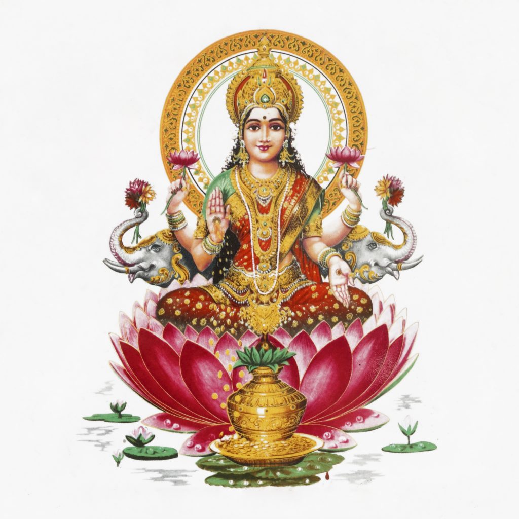 Hindu goddess lakshmi sitting on a lotus flower