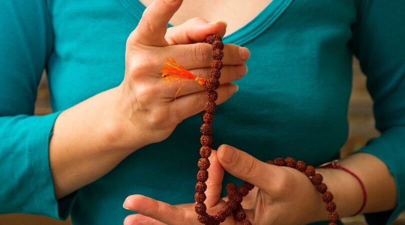 japa meditation with mala beads