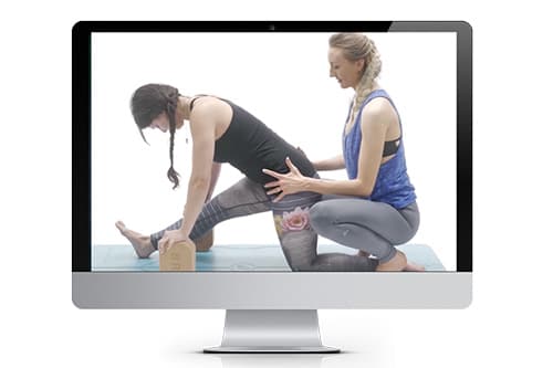 Online Yoga Teacher Training Showing Forward Fold Hands-On Adjustment
