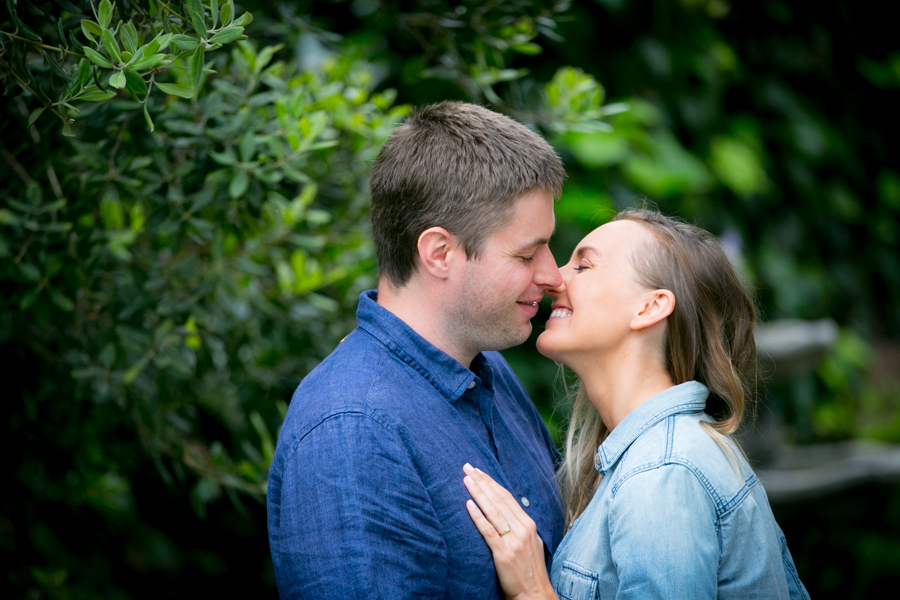 Brett Larkin leaning in for a kiss with her husband to illustrate ISHVARA PRANIDHANA - Transform Your Relationships