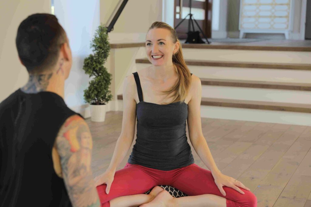 brett larkin teaching yoga in seated position-compressed