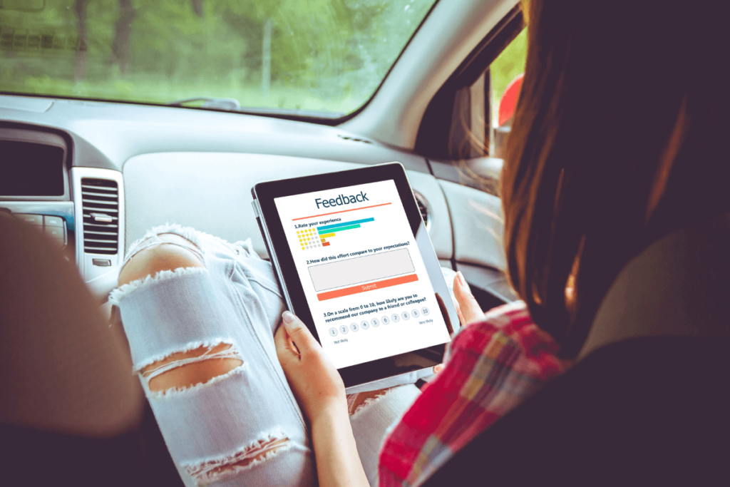 woman holding tablet leaving feedback for customer reviews